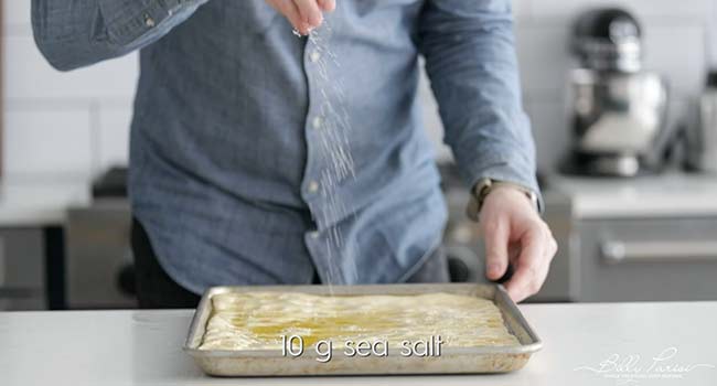 seasoning focaccia with salt