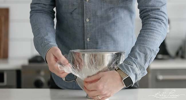 wrapping dough in plastic wrap