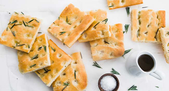 slice focaccia with fresh rosemary