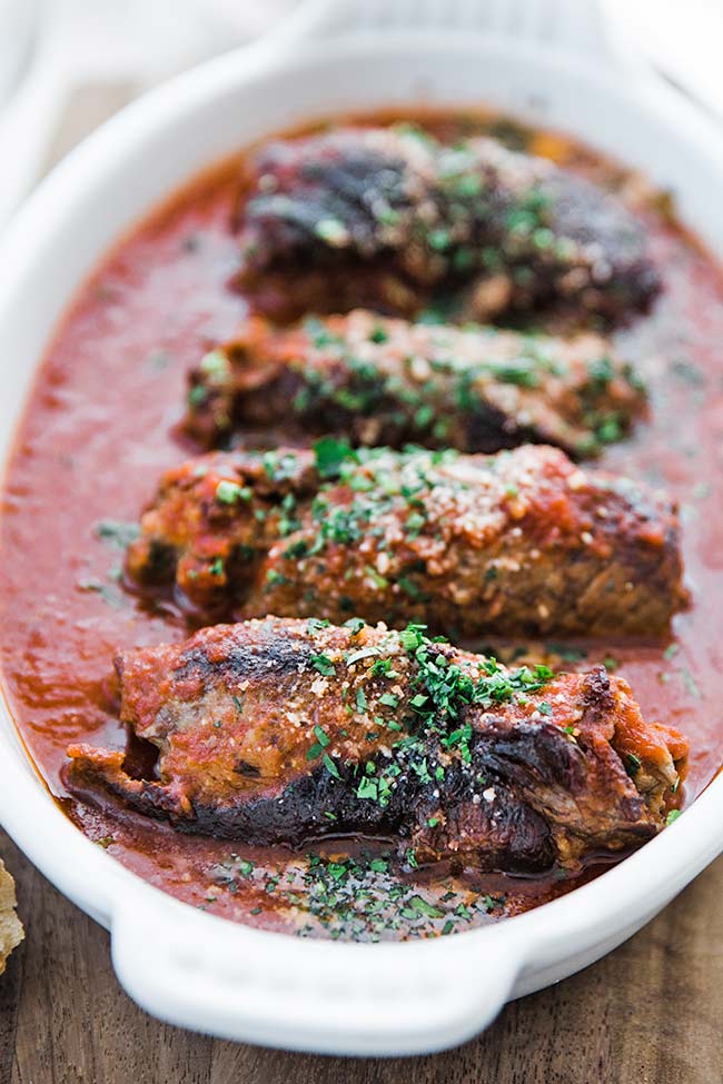 beef braciole in tomato sauce with herbs