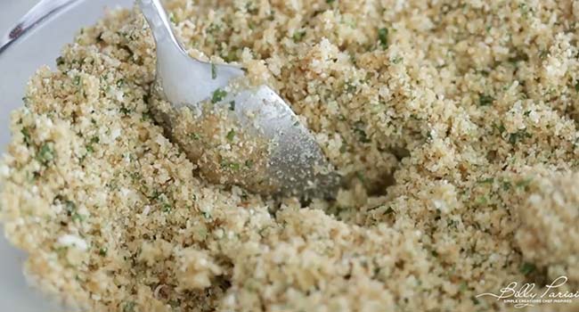 mixing herbs and breadcrumbs