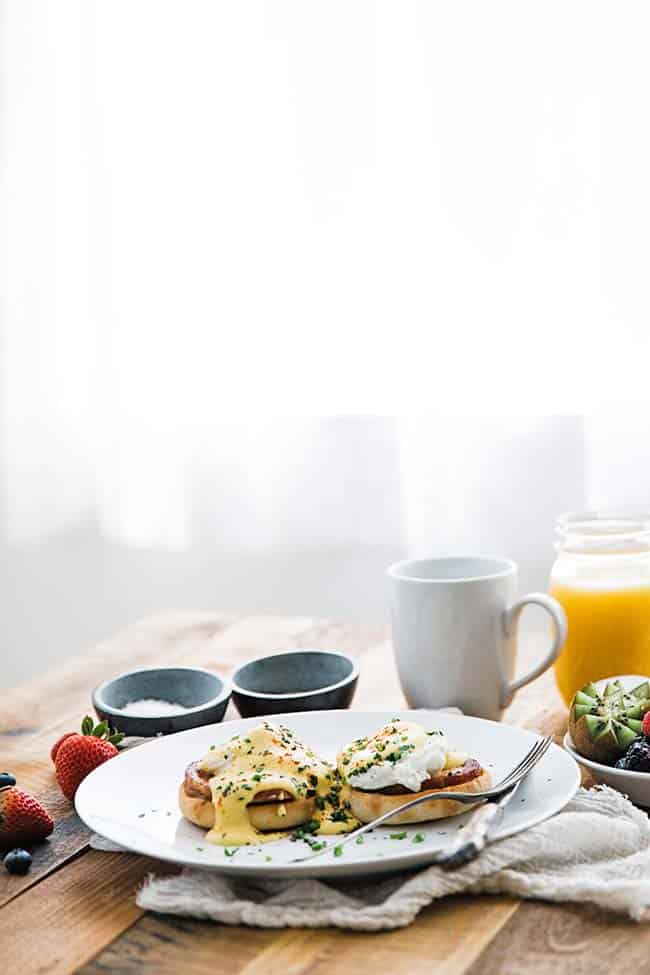 eggs benedict at breakfast table