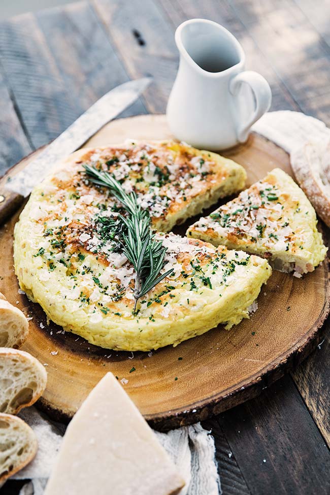 frittata with pancetta bacon, potatoes, parmesan cheese and fresh rosemary