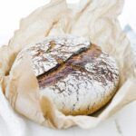 baked spelt bread in parchment paper