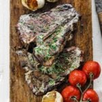 t bone steaks on a cutting board