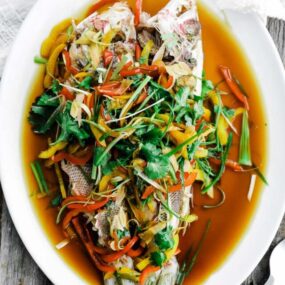 whole cooked head on fish with vegetables and soy