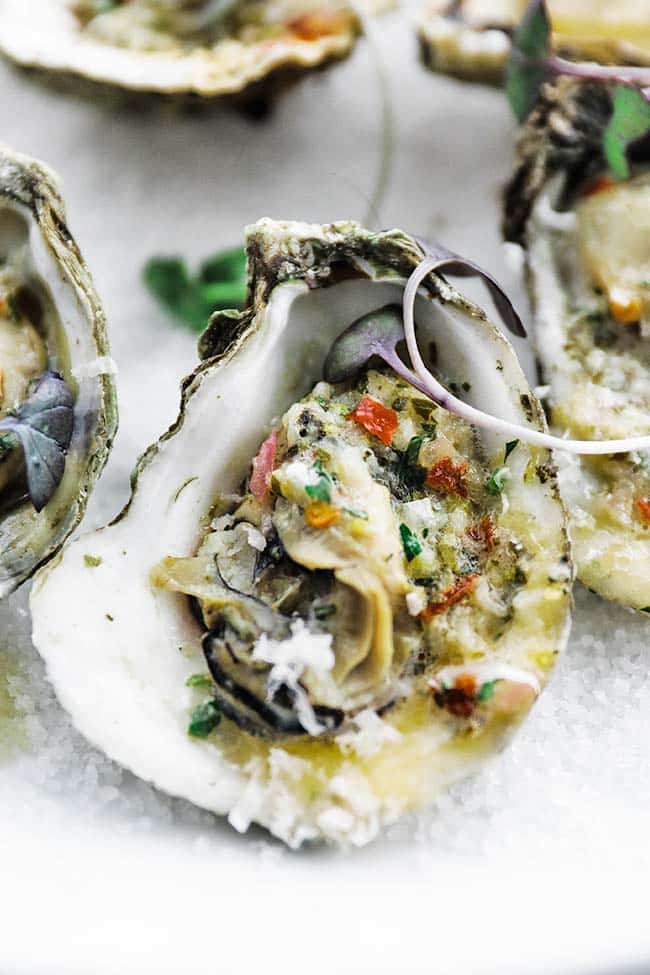 cooked oyster with mice greens and butter