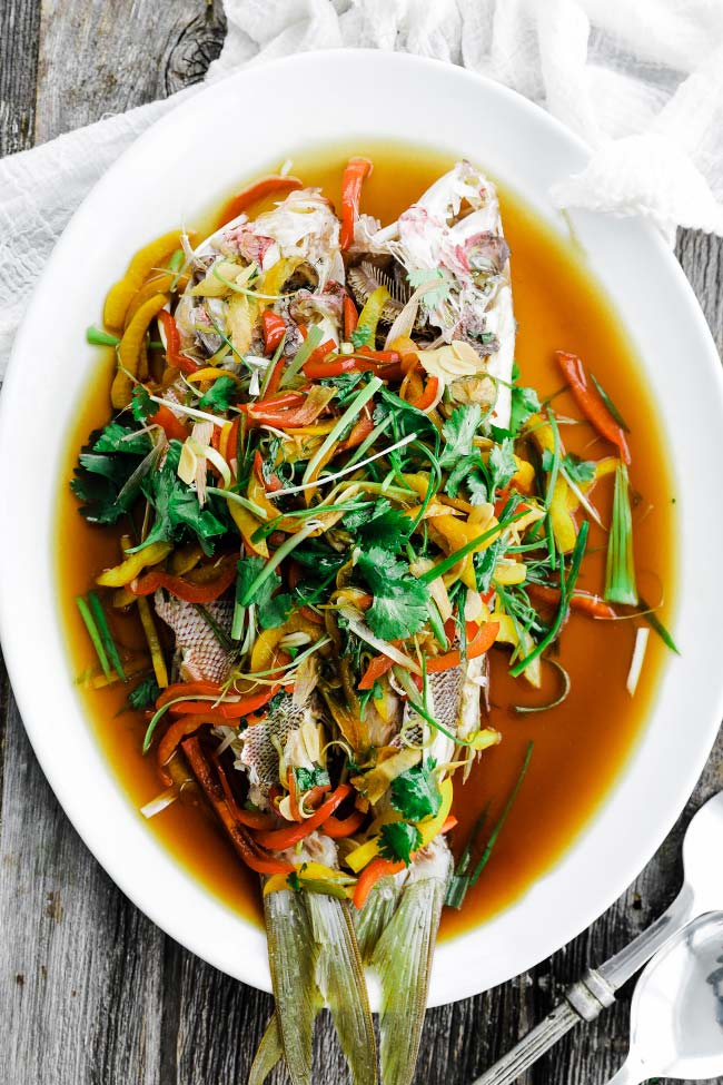 whole cooked head on fish with vegetables and soy