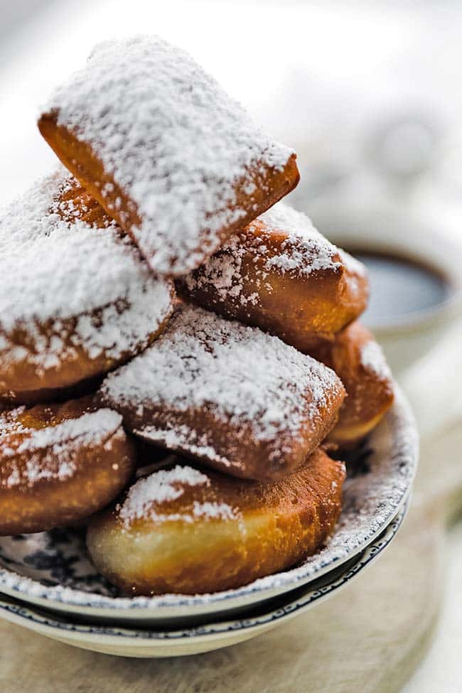 beignet donuts covered in powdered sugar