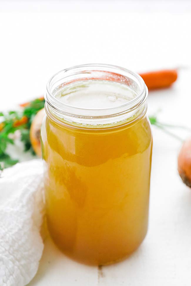 large glass mason jar of bone broth