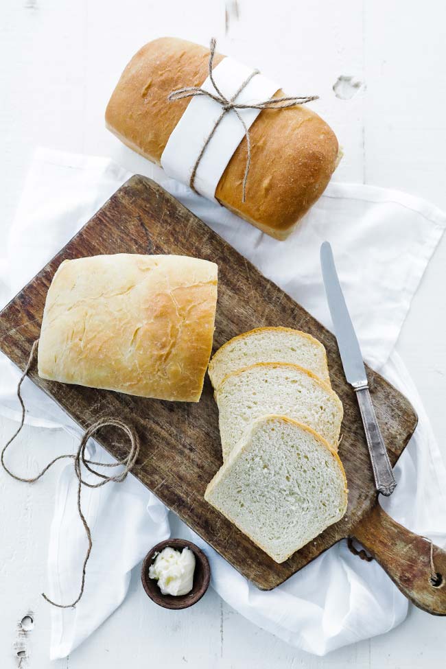loaves of homemade bread with bread slices