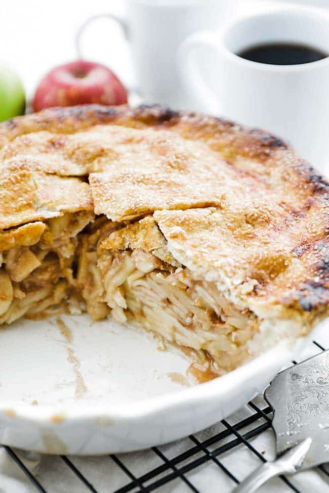 apple pie with slices taken out of it