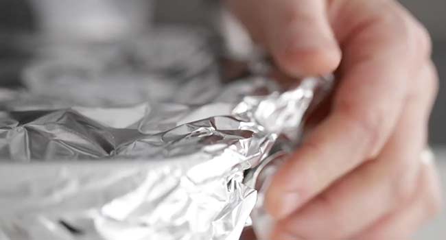 adding foil to a pan