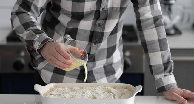 adding butter to breadcrumbs