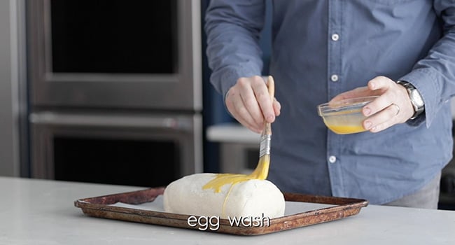 brushing beef wellington with eggs