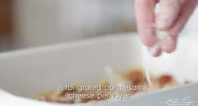 adding cheese to pasta