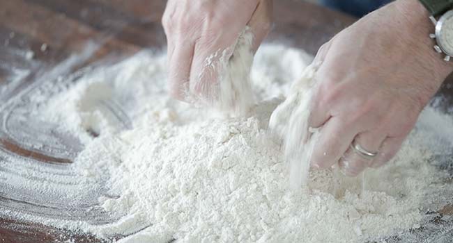 mixing flour and lard