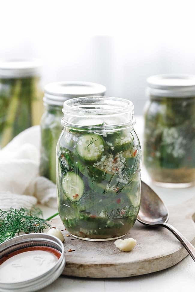 mason jars full of dill pickles