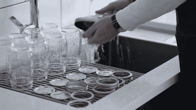 washing mason jars with hot soapy water