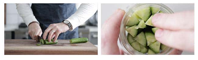 cutting cucumbers and placing them in mason jars
