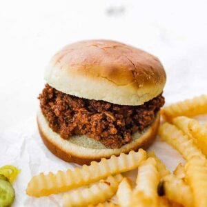 homemade sloppy joes on a bun with fries