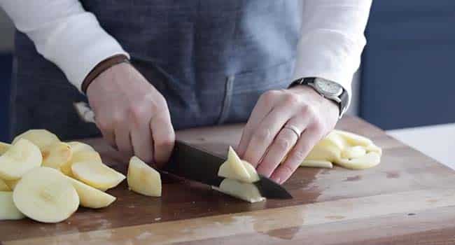 thinly slicing apple chunks