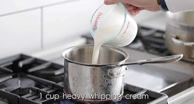 adding cream to a pot