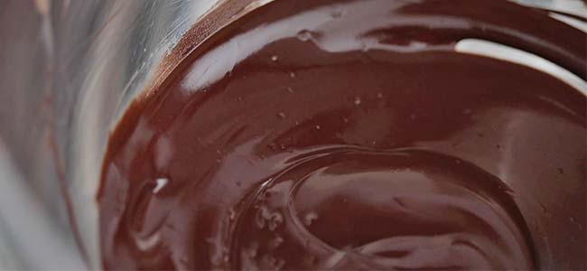 melted chocolate in a metal bowl