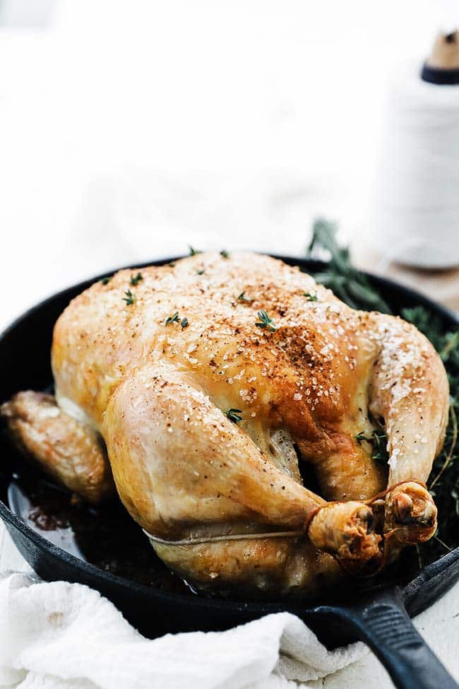 brown roasted chicken in a pan
