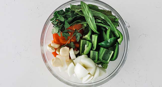 prepared peppers, onions, garlic in a bowl