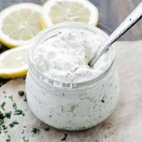 jar of homemade tartar sauce with a spoon