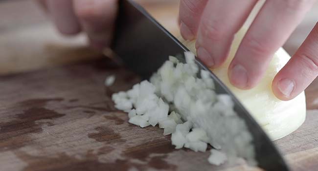 small dicing onions on a cutting board