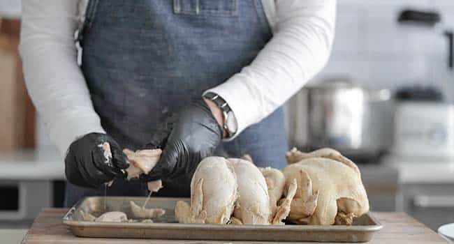 removing the skin from cooked whole chickens