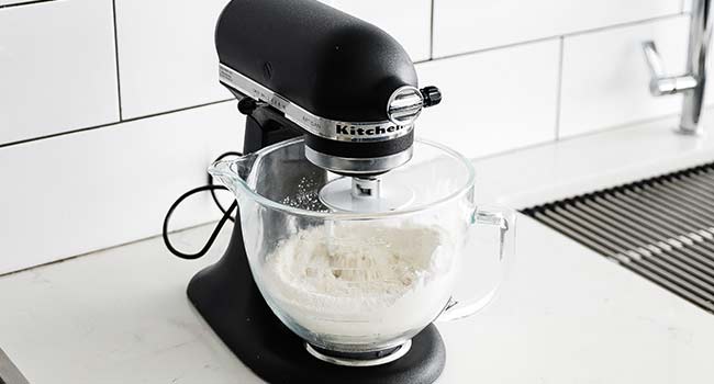 mixing flour in a stand mixer