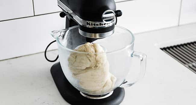 kneading a dough in a stand mixer
