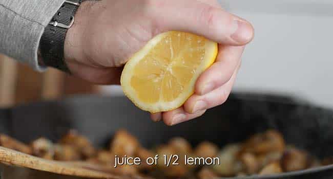 squeezing a lemon into food