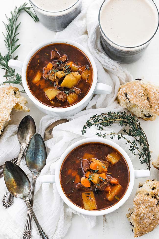 cups of irish beef stew served with soda bread