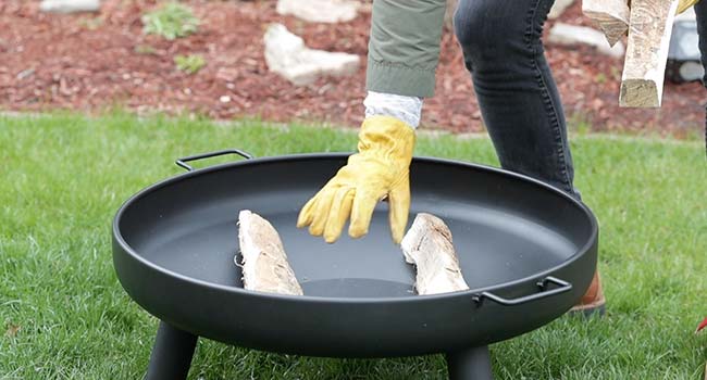 adding two logs to a fire pit 