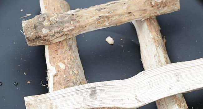 stacking wood cross wise in a fire pit