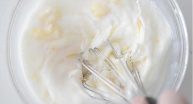 mixing together dry ingredients in a bowl