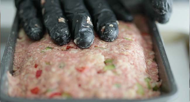 forming meatloaf into a loaf pan