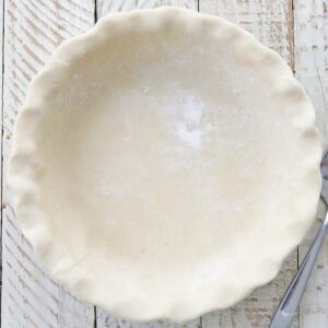 homemade pie dough in a fluted pie pan