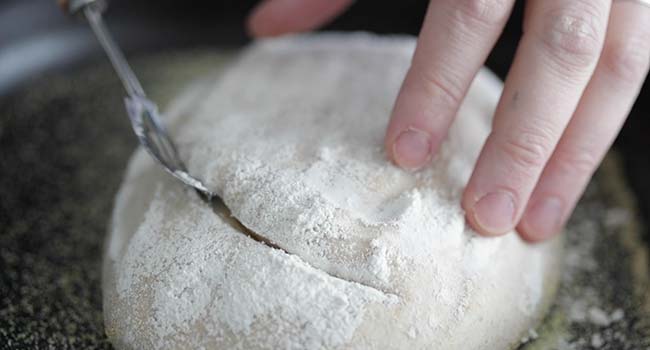 scoring sourdough bread