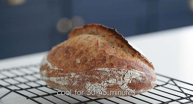 resting cooked bread on a rack