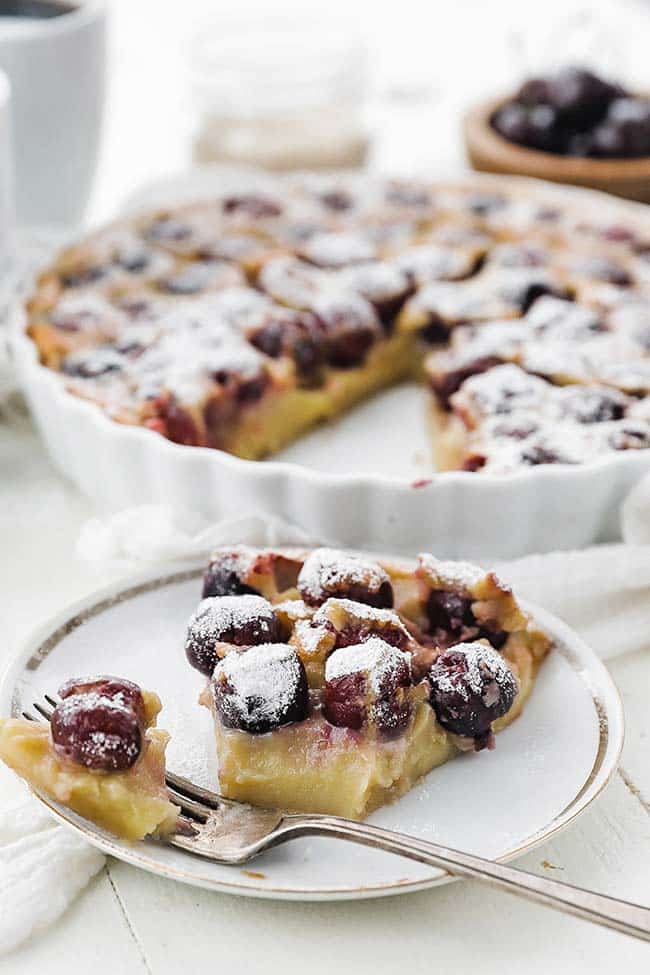 slice of cherry clafoutis on a plate 