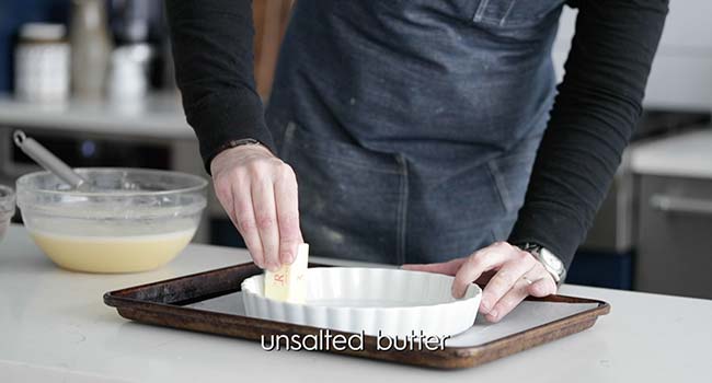 buttering a glass tart pan