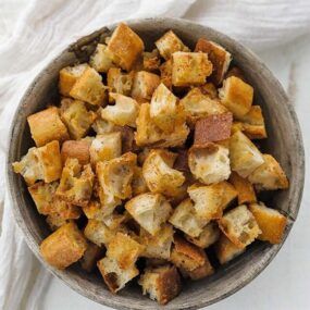 a bowl of browned bread croutons