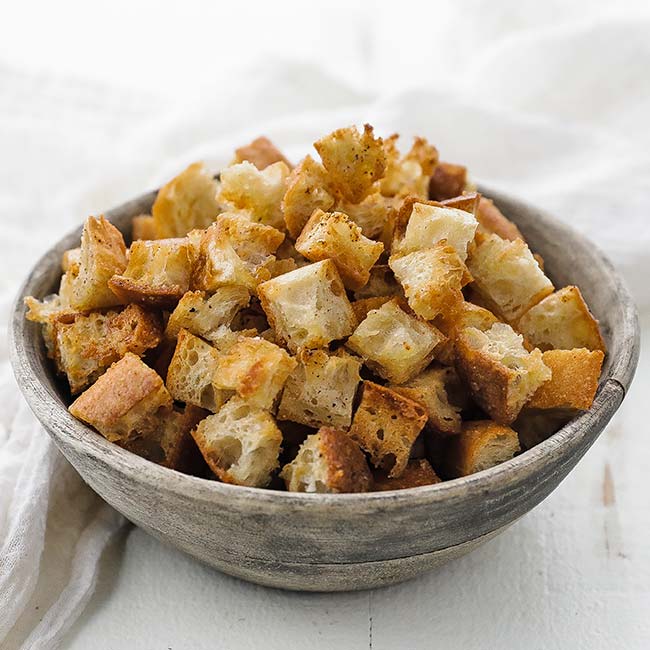 bowl of crunchy brown croutons