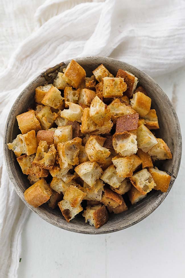 a bowl of browned bread croutons