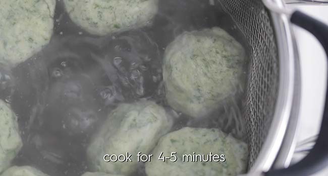 floating boiling gnudi in a pot